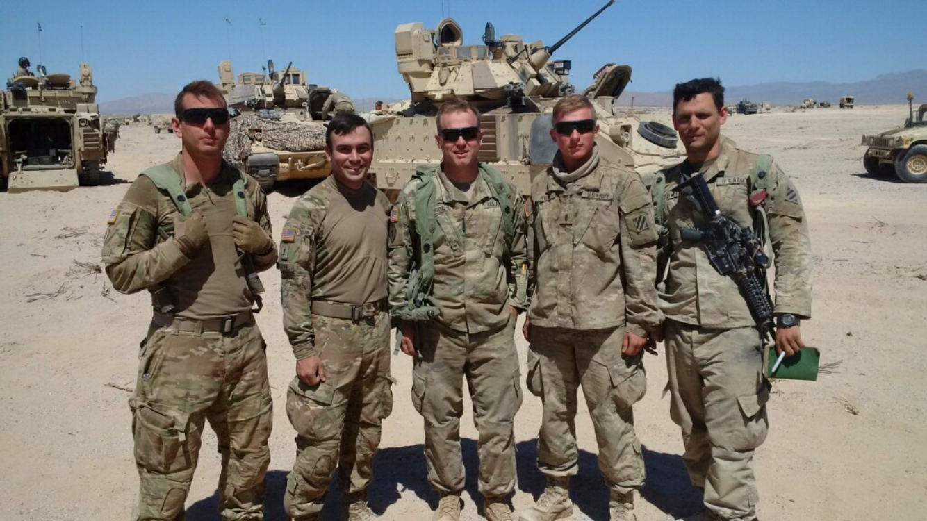 Jared Sunsdahl with his team in the field